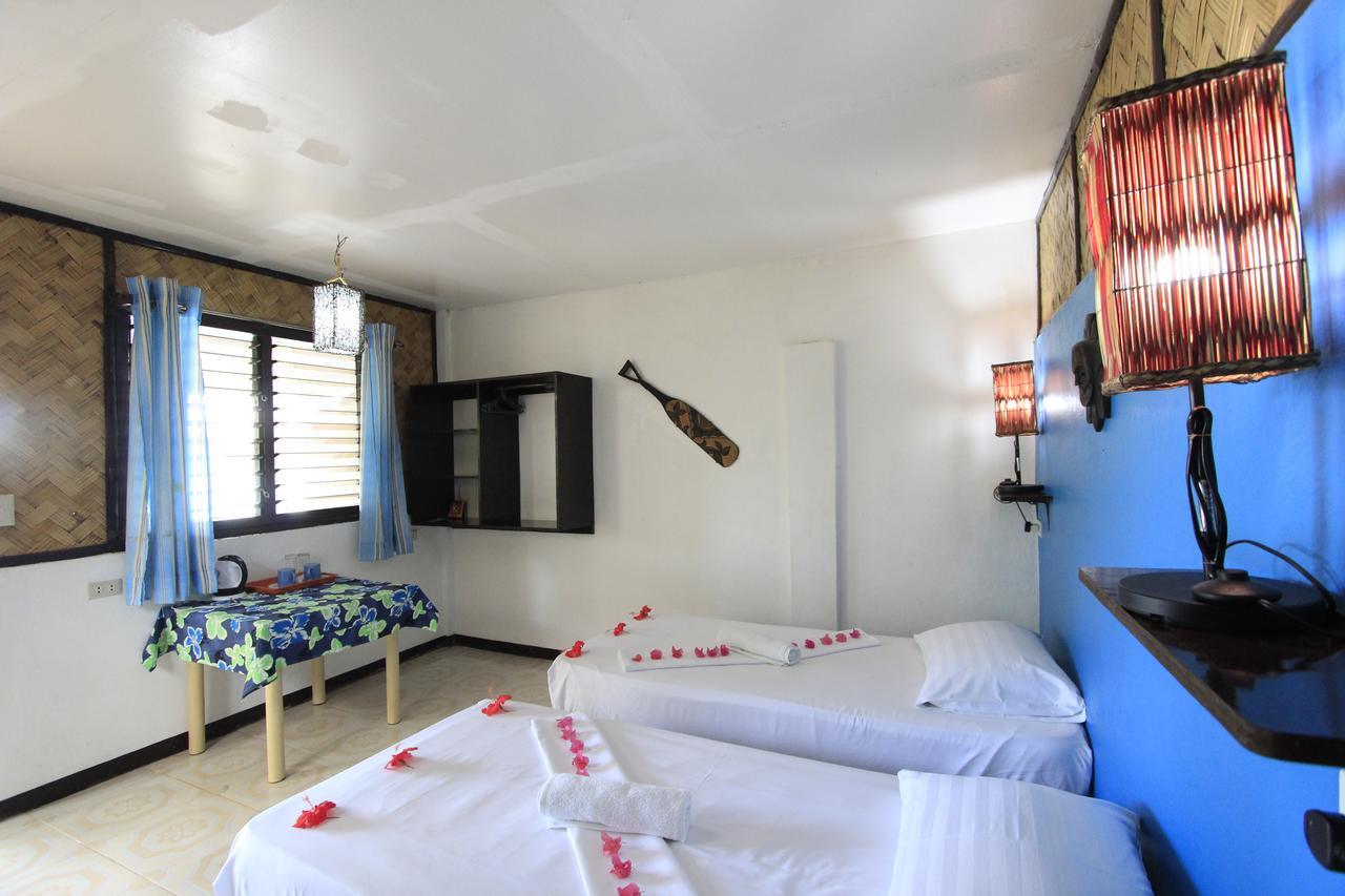 ดิสคัฟเวอรี ไอส์แลนด์ รีสอร์ต แอนด์ ไดฟ์ เซนเตอร์ Hotel โกรอน ภายนอก รูปภาพ