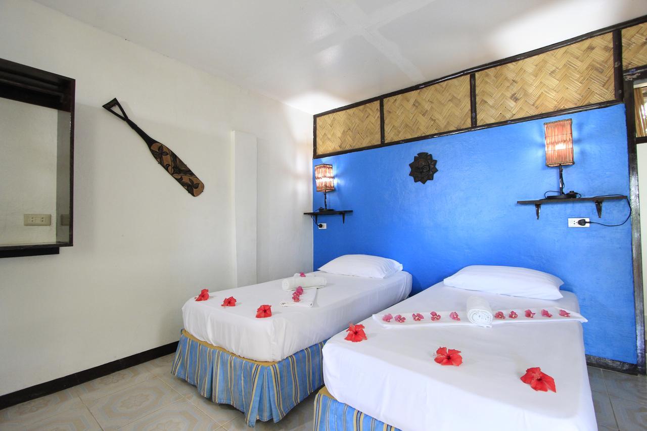 ดิสคัฟเวอรี ไอส์แลนด์ รีสอร์ต แอนด์ ไดฟ์ เซนเตอร์ Hotel โกรอน ภายนอก รูปภาพ